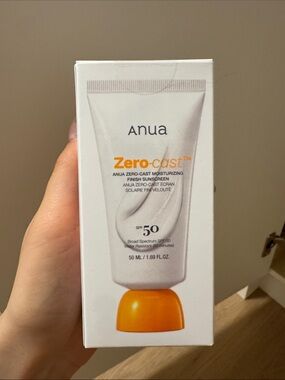 Anua Zero-cast Moisturizing Finish Sunscreen SPF 50 — White & Orange